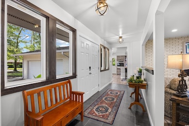 Entryway featuring baseboards
