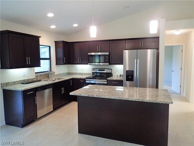 KITCHEN WITH UNDER CABINET LIGHTING AT 531 SE 32nd TER