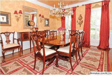 The dining room features a beautiful antique cryst