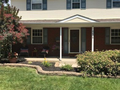 COVERED FRONT PORCH.