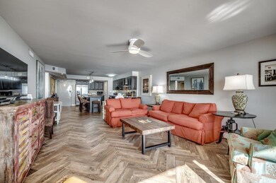 Living room featuring parquet floors and ceiling f