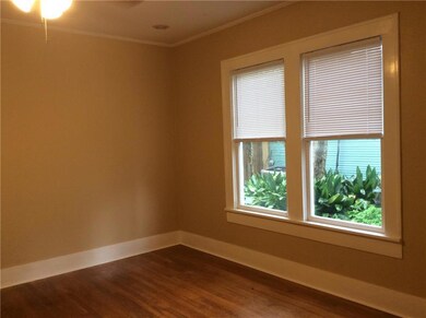 Bonus room view, ceiling fan, hardwood