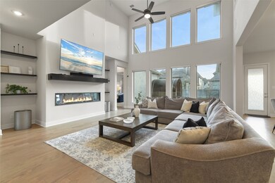 THE FAMILY ROOM IS BOTH COMFORTABLE AND STYLISH WI