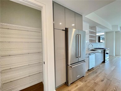 Pantry featuring a sink