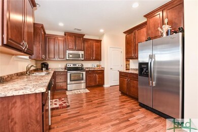 Kitchen with stainless appliances and plenty of ca