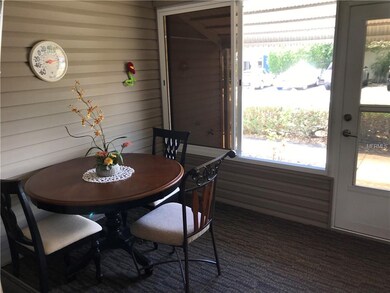 With the ceiling fan and the new carpet, the glass