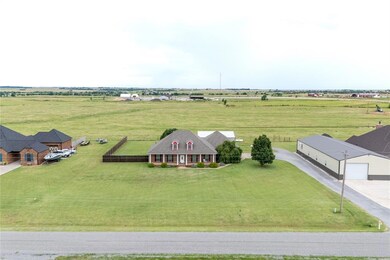 Aerial view of sparsely populated area with a pastoral area