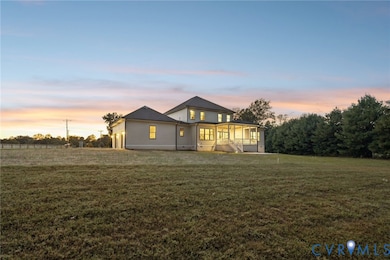 View of front of house featuring a front yard and crawl space
