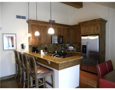 Kitchen with slab-granite counters