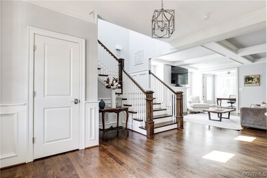 grand extra wide staircase leading to second floor