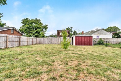 Fenced Backyard & Outbuilding