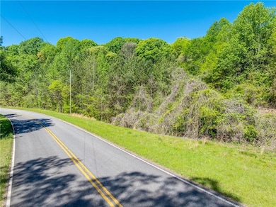 View of road with a wooded view