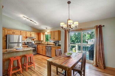 Dining room walks out to a multi leveled deck.  Yo