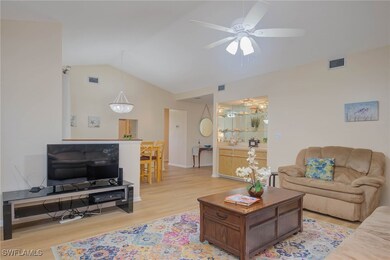 Living room featuring light hardwood / wood-style