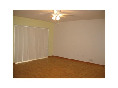 Living Room. Ceiling fans reduce utility costs.
