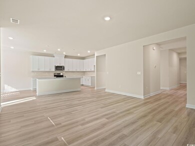 Unfurnished living room with light hardwood / wood