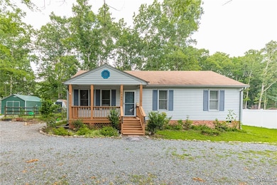 View of front of house featuring a porch, a shingl