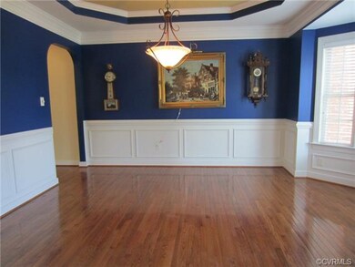 Formal Dining Room boasts Hardwood Flooring, Tray 