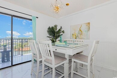 Dining area featuring a chandelier, marble finish 