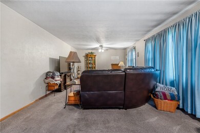 The spacious living room is large enough for plent