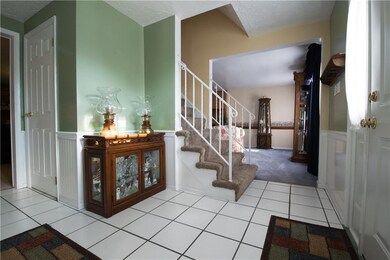 Ceramic tile entrance with wainscoating