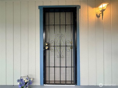 Front door with screen door.