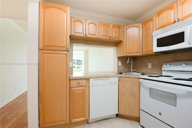 9420 Poinciana Place unit 210, Davie, FL 33324 - photo 6