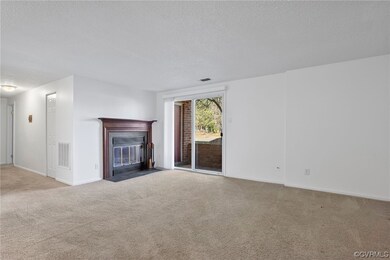 Spacious living room with door to patio