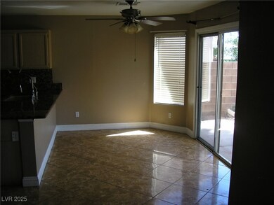 Unfurnished dining area featuring a sink, a ceilin