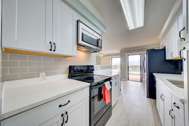 kitchen with tile backsplash