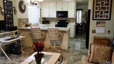 Open, airy kitchen with lots of cabinet space and 