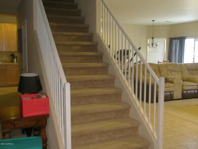 stairs to 4 bedrooms and loft area