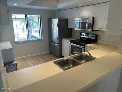 Kitchen featuring light hardwood / wood-style floo
