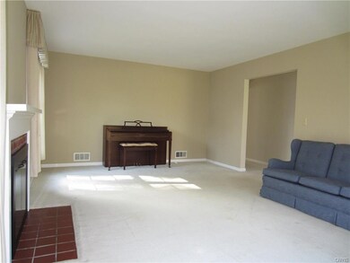 Living room view to entryway