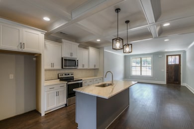 Pics are of the building next door. Floorplans are the same. Colors and finishes may vary. Finished pictures coming soon! 