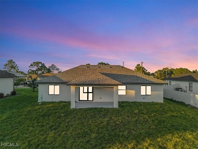 711 Roosevelt Ave, Lehigh Acres, FL 33936 - photo 3