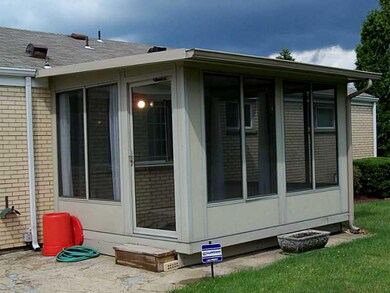 Exterior Back. Sunroom