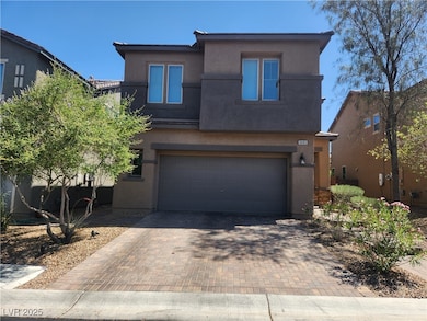 View of front of home with stucco siding, decorati