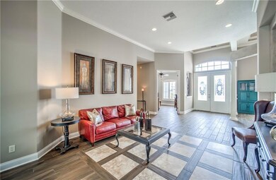 Another view of the Living Room, Foyer, and the Of