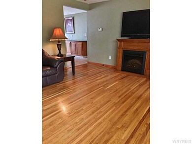 Living Room. Fireplace is included and gives this 