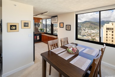 Dining room with kitchen to the left.