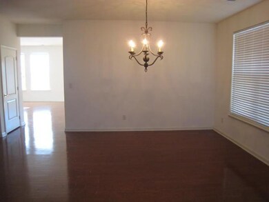 Formal dining room that opens into the f