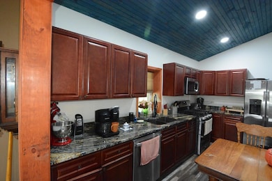 792 West Rd, Portage, ME 04768 - photo 2