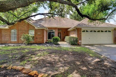 Ranch-style home featuring a garage