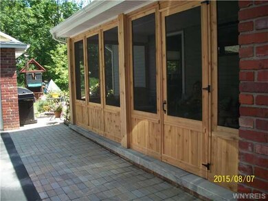 Backyard Enjoy the wooded lot on the new cedar scr
