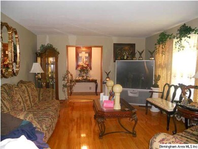 Living room facing foyer. See the beautiful floori