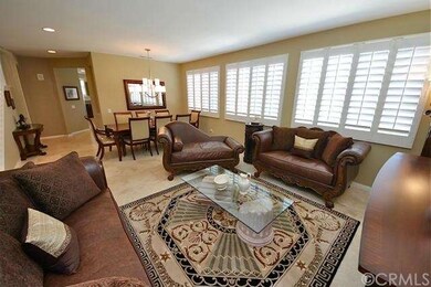 Formal living room open to dining room.