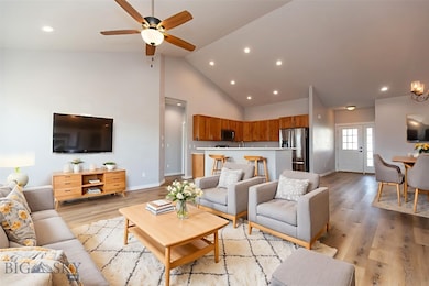 Living area with vaulted ceilings. virtual staging