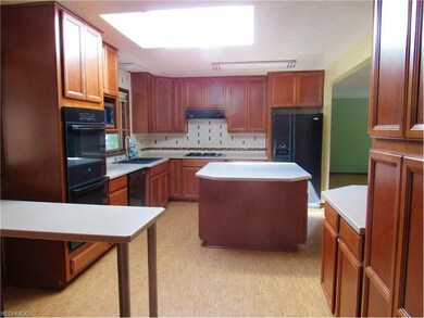 Beautiful updated kitchen with newer maple cabinet