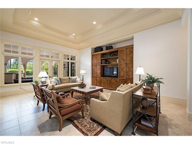 Grand great room with double tray ceiling and buil